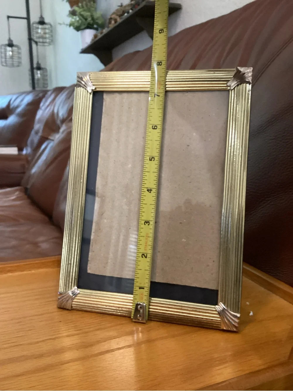 Gold Ribbed Photo Frame with silver accents holds a 5x7
